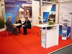 Oberbürgermeisterin Dr. Dietlind Tiemann und Wirtschaftsförderer Reiner Heublein im Gespräch mit HVLE-Vorstand Günter Alsdorf (links).