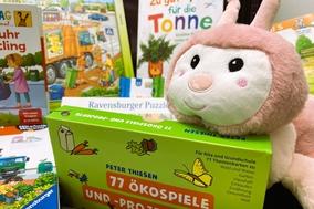 Kuscheltier mit Umweltspielen.