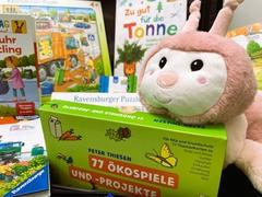 Kuscheltier mit Umweltspielen.