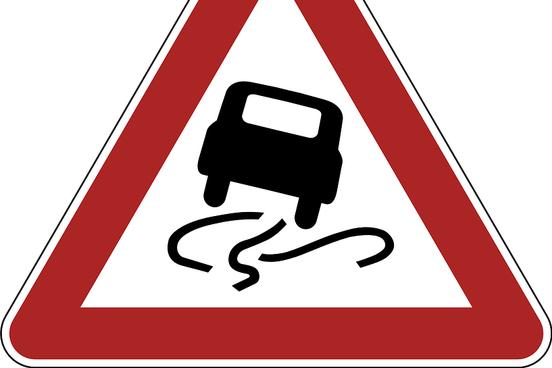 Verkehrszeichen mit rutschendem Auto