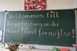Willkommen auf Dänisch auf einer Tafel