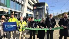 Steffen Scheller, Katarzyna Lettau und Jörg Vogler beim Banddurchschnitt.
