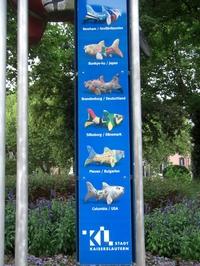 Schild mit Fischen