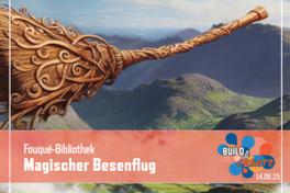 Ein Besen fliegt im Himmel.