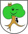 Wappen mit Baum an dem Specht pickt