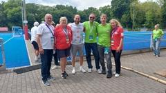 Der Präsident des Landesverbandes Special Olympics, Matthias Pietschmann mit anderen Organisatoren.