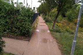 Wegefläche der Uferpromenade am Mühlengraben wird repariert