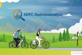Bild mit zwei Radfahrern die durch eine Landschaft fahren