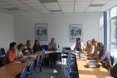 Regattastrecken-Chef, Projektverantwortliche, Planer und Bauleute stimmen Arbeitsschritte und Termine ab.