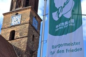 "Bürgermeister für den Frieden" – eine Flagge mit Signalwirkung.