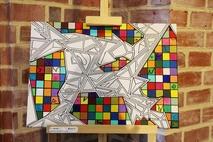 mosaikartige abstrakte Kunst mit dem Titel "Neuausrichtung".