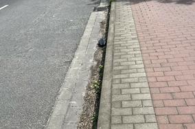 verschmutzte Fahrbahn