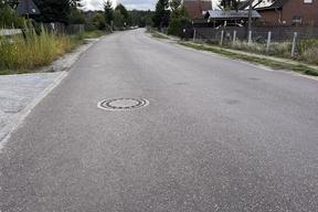 neue Fahrbahnoberfläche im Buchenweg