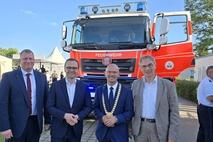 Beigeordneter Thomas Barz, Innenminister Dr. Jan Redmann, Oberbürgermeister Daniel Keip und OLG-Präsident Matthias Deller.