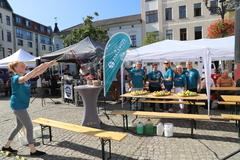 Stand des Asklepios Fachklinikums mit Seifenblasen-Pusten.
