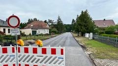 Der geebnete, frisch asphaltierte Buchenweg.